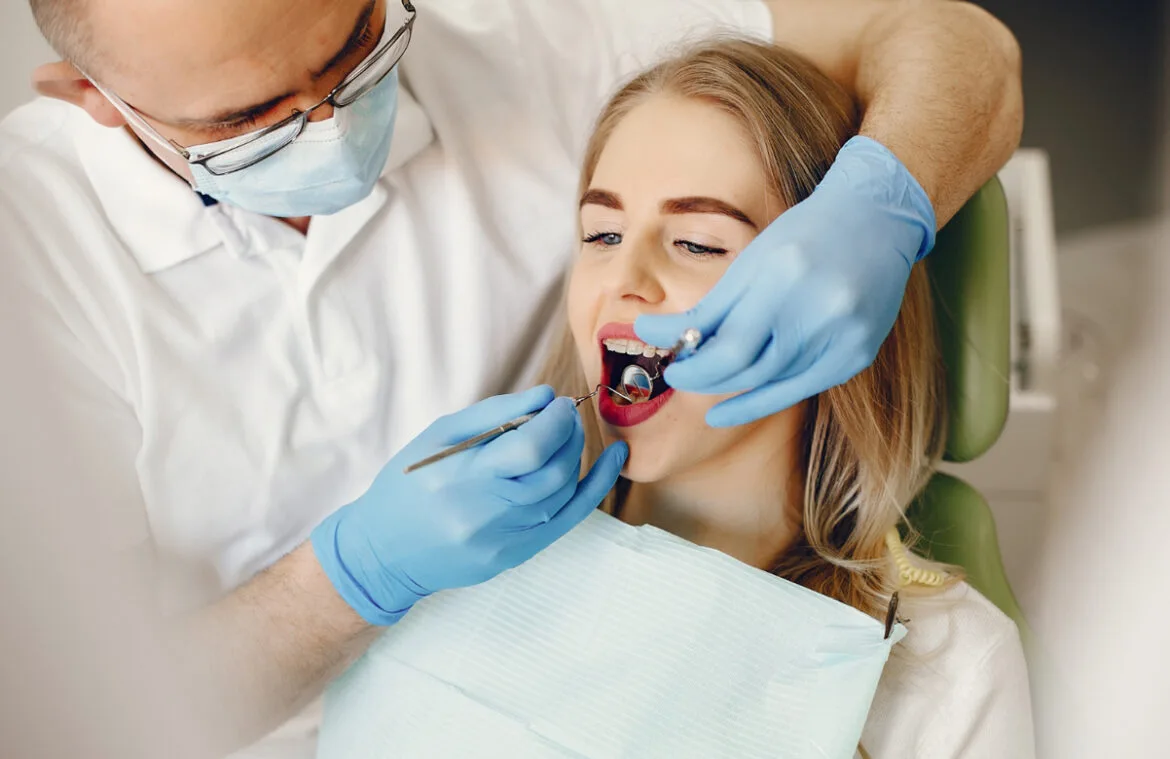Simpladent Clinics Visakhapatnam - Dental Crowns beautiful girl sitting dentist s office